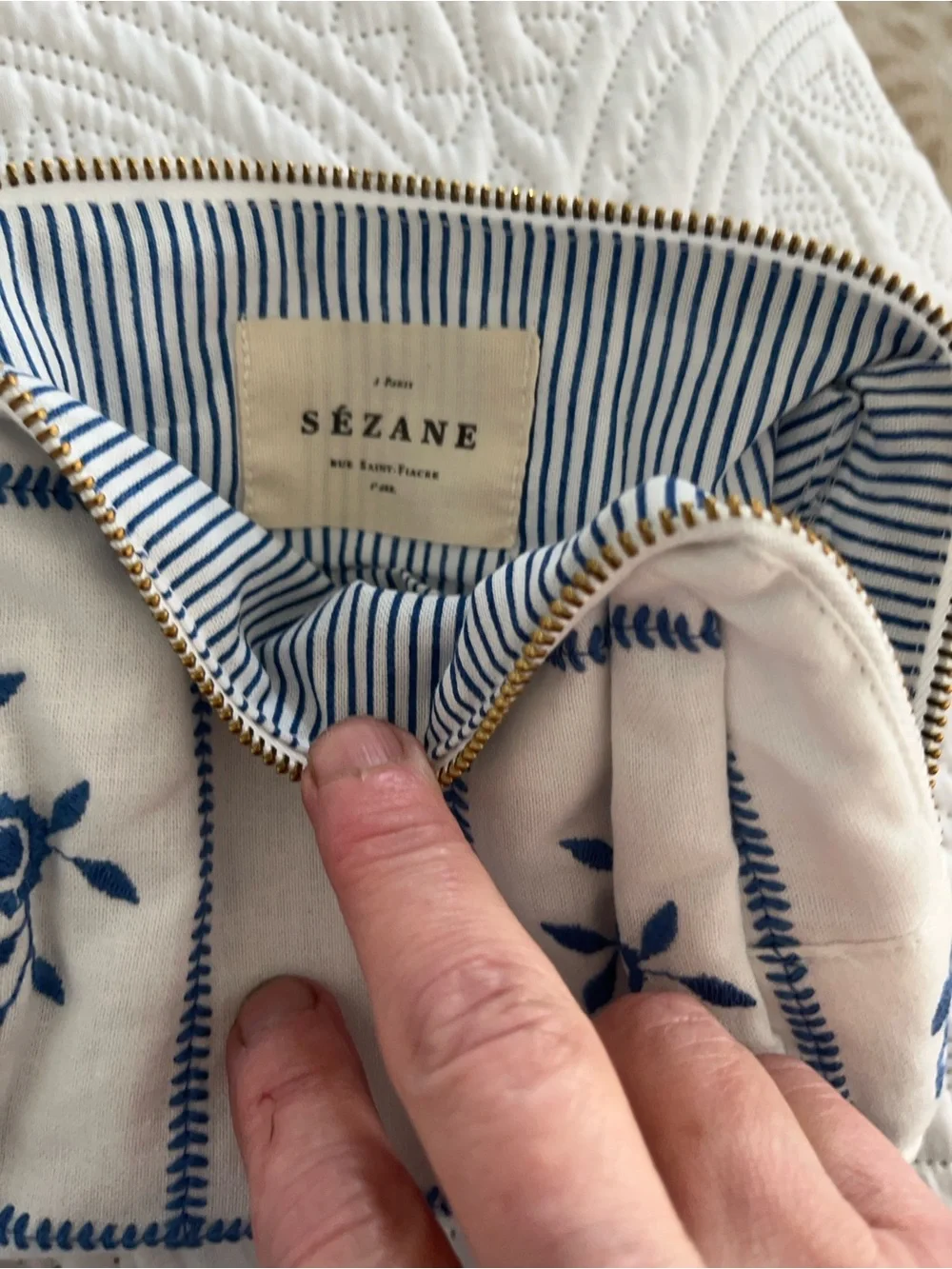 Sezane white and blue embroidery zip makeup bag